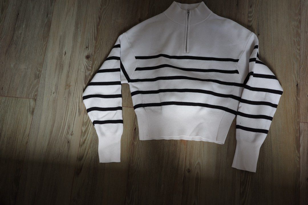 White and Black Striped Quarter Zip Sweater (Category: Coats, Jackets and Outerwear) located in Santa Rosa. Submitted by mooseproject (Listing ID 1468751190, Image 1). Description: - Color/Pattern: Classic white with horizontal black stripes - Design: Quarter-zip high collar with ribbed cuffs and hem - Fit: Trendy cropped style - Condition: Pristine, zero visible wear, no loose threads.