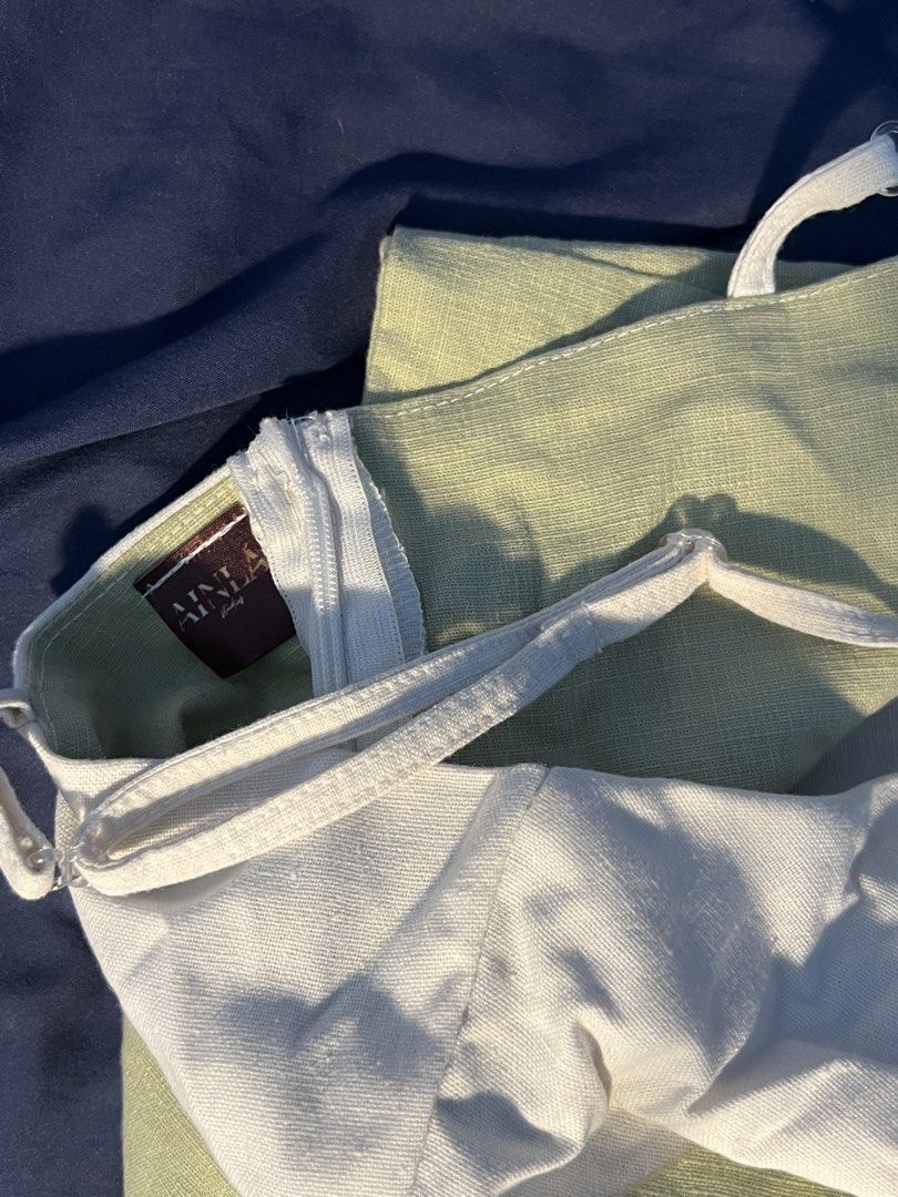 White and Sage Green Halter Crop Top (Category: Sleeveless) located in Marikina City. Submitted by yssacee (Listing ID 1468919082, Image 3). Description: - crop top in white and sage green colorblock. -Features adjustable spaghetti straps and a halter neckline. - Zip closure at the back. - pm for more photos - shipping from lower antipolo rizal.