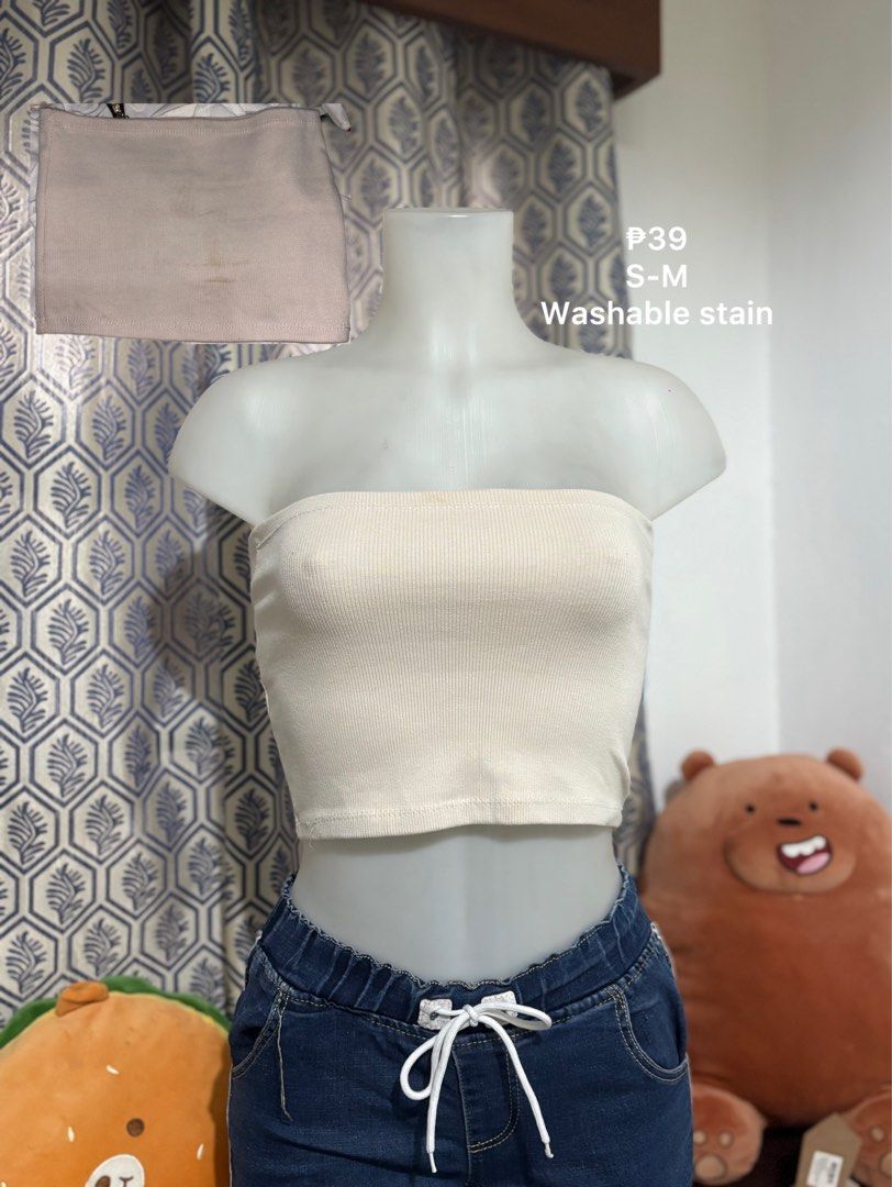 White Button-Down Spaghetti Strap Crop Top S-M (Category: Sleeveless) located in Baguio. Submitted by aella_nyx (Listing ID 1468761708, Image 2). Description: - Color/Design: White crop top with spaghetti straps and brown front buttons - Fit: Comfortably fits small to medium frames - Fabric: Lightweight and versatile, perfect to pair with jeans or shorts - Condition: Good, with a washable stain (please check the photo) ✨Limit expectations—this is