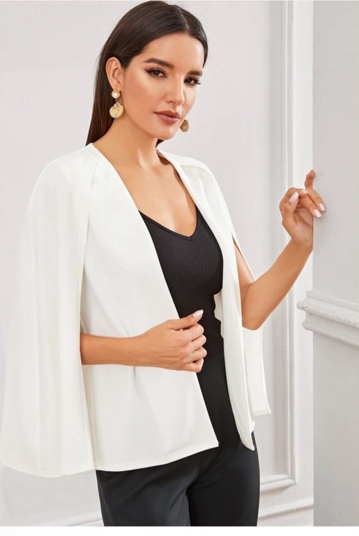 White Cape Blazer Split Sleeve Open Front Jacket (Category: Coats, Jackets and Outerwear) located in Caloocan City. Submitted by mylove326 (Listing ID 1468777679, Image 1). Description: - Style: White open-front cape blazer with modern split sleeves - Condition: Worn a couple of times, still in solid shape - Features: Structured seams down the front - Versatility: Great layering piece for work or going out - ndi nagamit. Need wash lang natago lan
