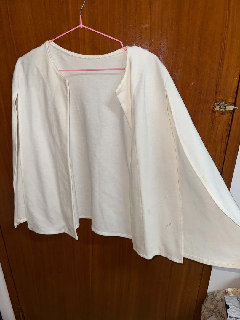 White Cape Blazer Split Sleeve Open Front Jacket (Category: Coats, Jackets and Outerwear) located in Caloocan City. Submitted by mylove326 (Listing ID 1468777679, Image 3). Description: - Style: White open-front cape blazer with modern split sleeves - Condition: Worn a couple of times, still in solid shape - Features: Structured seams down the front - Versatility: Great layering piece for work or going out - ndi nagamit. Need wash lang natago lan