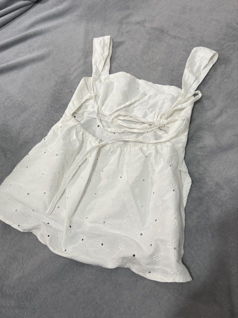 White Eyelet Backless Babydoll Top (Category: Sleeveless) located in Capas. Submitted by blesseee_d (Listing ID 1468748849, Image 2). Description: DM me! 💕.
