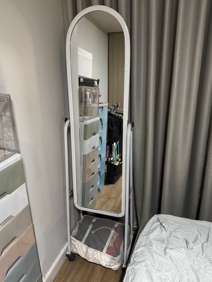 White Full Length Standing Mirror with Wheels (Category: Mirrors) located in Caloocan City. Submitted by newcrystal_3b43ba (Listing ID 1468798840, Image 1). Description: - Full-length mirror with a chic white frame and rounded top edge - Equipped with wheels at the base for effortless moving around the house - Sturdy built-in metal stand for stable, standalone placement - Ideal fit for bedrooms, walk-in closets, or dressing areas - Condition: Bra