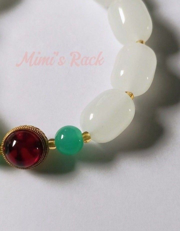 WHITE JADE CALM & CLASSY BRACELET (Category: Bracelets) located in Taguig. Submitted by mimisrack (Listing ID 1468815202, Image 3). Description: 🤍Peace on your wrist. Grace in every move. -Promotes calm energy and smooth life flow -Supports balanced emotions and clear decisions -Elegant white tones - clean, classy, timeless -Perfect for everyday wear or meaningful gifting -For the woman who moves quietly... but powerfully. 🧿 barrel size: 12mm �
