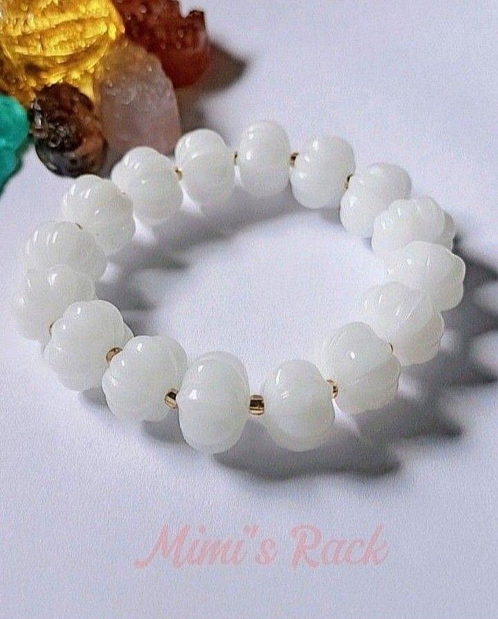 WHITE JADE PUMPKIN BLESSING BRACELET (Category: Bracelets) located in Taguig. Submitted by mimisrack (Listing ID 1468929682, Image 2). Description: 🤍Gentle. Lucky. Protective. -Attracts smooth fortune and steady blessings -Promotes peace, harmony, and emotional balance -Symbol of health, prosperity, and protection -Elegant white glow - clean, classy, timeless For the woman who wants quiet luck and graceful abundance 🧿 Bead size: 14mm 💎Gems & c