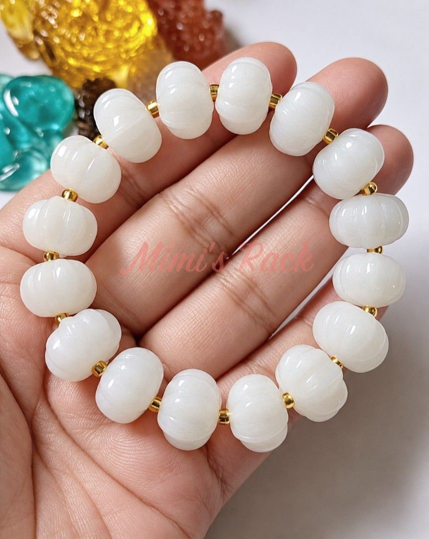 WHITE JADE PUMPKIN BLESSING BRACELET (Category: Bracelets) located in Taguig. Submitted by mimisrack (Listing ID 1468929682, Image 1). Description: 🤍Gentle. Lucky. Protective. -Attracts smooth fortune and steady blessings -Promotes peace, harmony, and emotional balance -Symbol of health, prosperity, and protection -Elegant white glow - clean, classy, timeless For the woman who wants quiet luck and graceful abundance 🧿 Bead size: 14mm 💎Gems & c