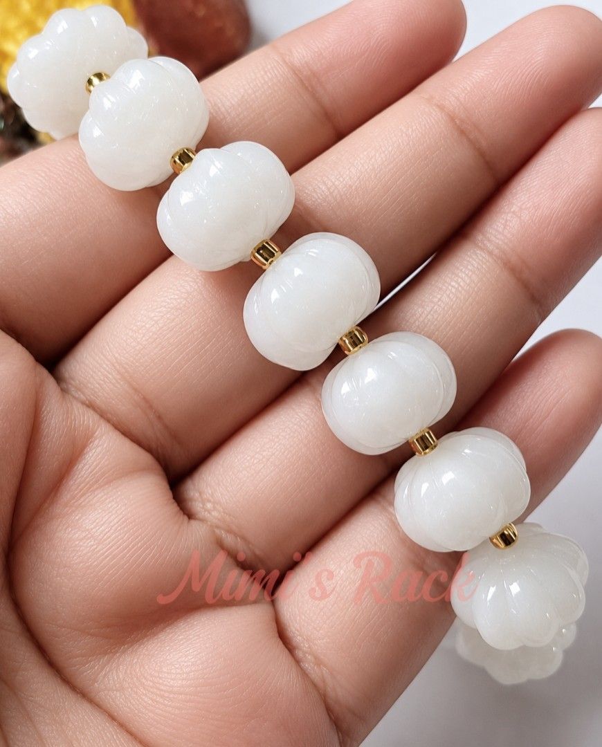 WHITE JADE PUMPKIN BLESSING BRACELET (Category: Bracelets) located in Taguig. Submitted by mimisrack (Listing ID 1468929682, Image 3). Description: 🤍Gentle. Lucky. Protective. -Attracts smooth fortune and steady blessings -Promotes peace, harmony, and emotional balance -Symbol of health, prosperity, and protection -Elegant white glow - clean, classy, timeless For the woman who wants quiet luck and graceful abundance 🧿 Bead size: 14mm 💎Gems & c
