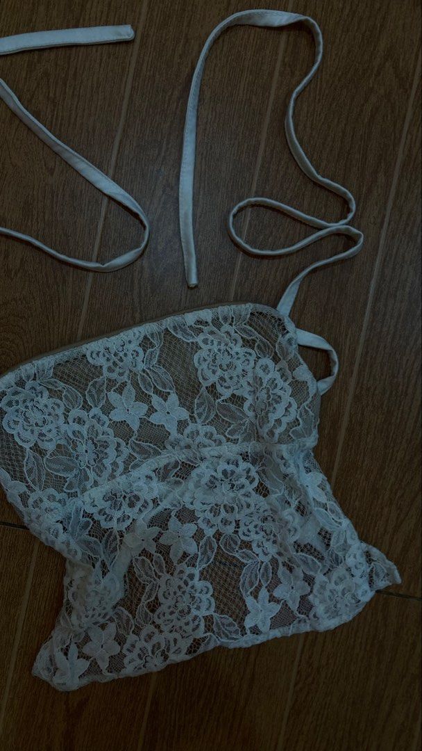 White lace halter top with tie straps (Category: Sleeveless) located in Subic. Submitted by bottomjeanzgals (Listing ID 1468842402, Image 2). Description: condi: used it only once.