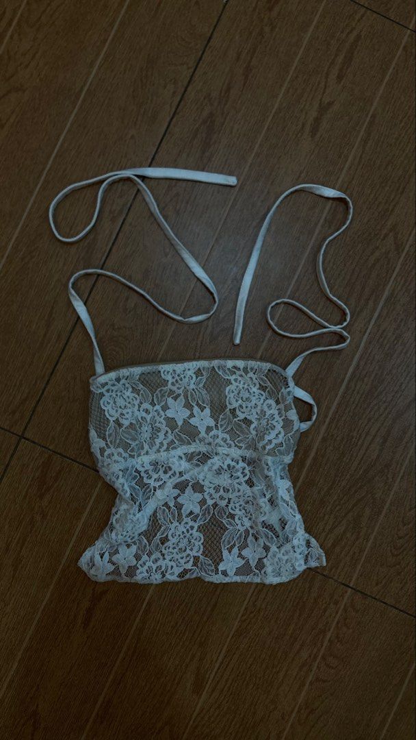 White lace halter top with tie straps (Category: Sleeveless) located in Subic. Submitted by bottomjeanzgals (Listing ID 1468842402, Image 1). Description: condi: used it only once.