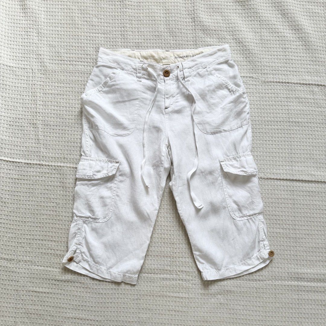 white linen capris (Category: Shorts) located in Cabanatuan. Submitted by brokegirlwholovesclothes (Listing ID 1468737062, Image 1). Description: - size 0 on tag but fits S-M - waist 28", length 23" - has a waist tie, can be adjusted to smaller waist! - has small stain on left pocket (see last photo) .
