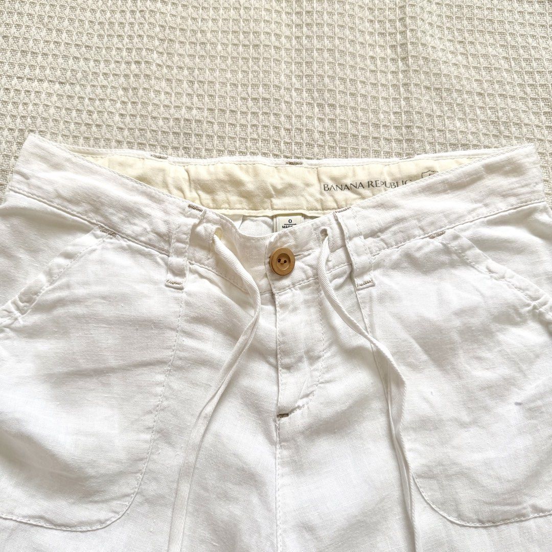 white linen capris (Category: Shorts) located in Cabanatuan. Submitted by brokegirlwholovesclothes (Listing ID 1468737062, Image 3). Description: - size 0 on tag but fits S-M - waist 28", length 23" - has a waist tie, can be adjusted to smaller waist! - has small stain on left pocket (see last photo) .