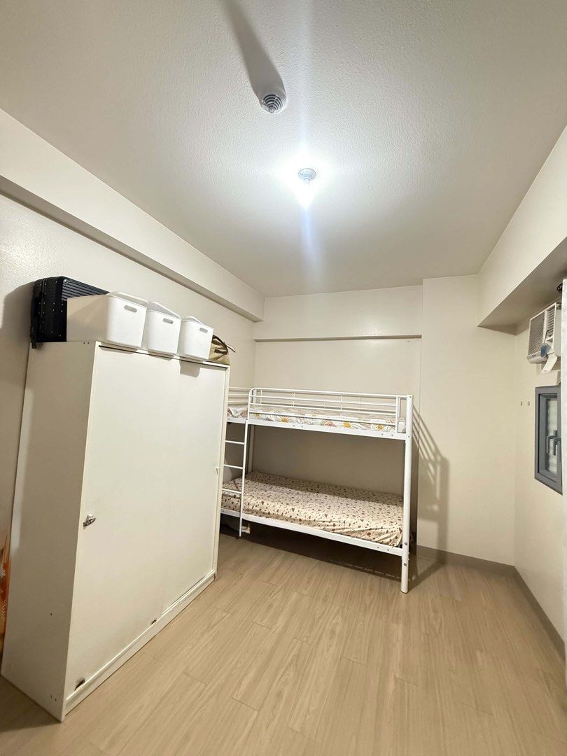 White Metal Bunk Bed Frame (Category: Bed Frames & Mattresses) located in Manila. Submitted by goldenfish.dc5c9f (Listing ID 1468836756, Image 3). Description: MANDUE - used only for 6 months - Material: Sturdy metal frame with built-in slats - Design: Double-decker / Bunk bed with a built-in ladder on the right side - Mattress Fit: Fits standard single .