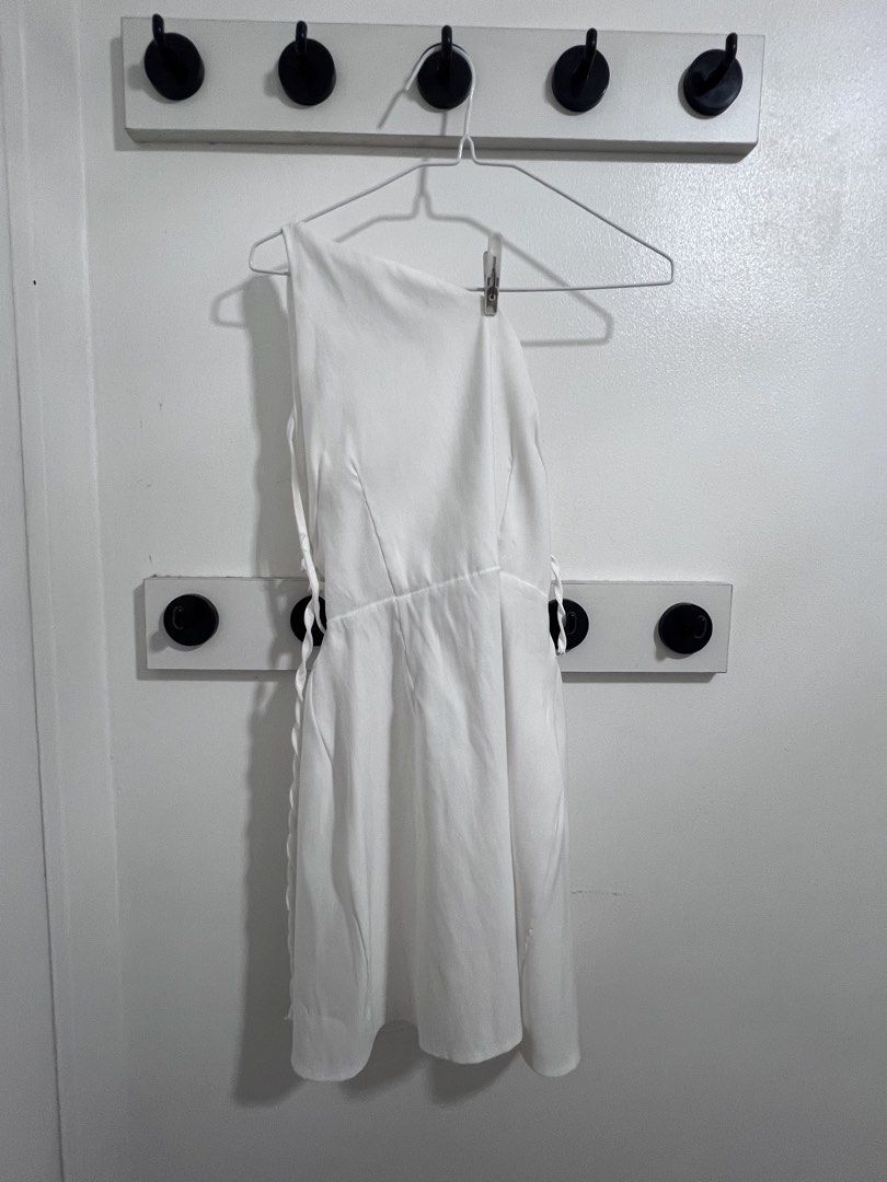 white one-shoulder summer dress (Category: Dresses) located in Bulacan. Submitted by jaenaissante (Listing ID 1468924316, Image 1). Description: - adjustable side ties for a better fit - has minor yellow stains near the top edge inside the dress, but it’s not visible outside; selling as-is - read bio.
