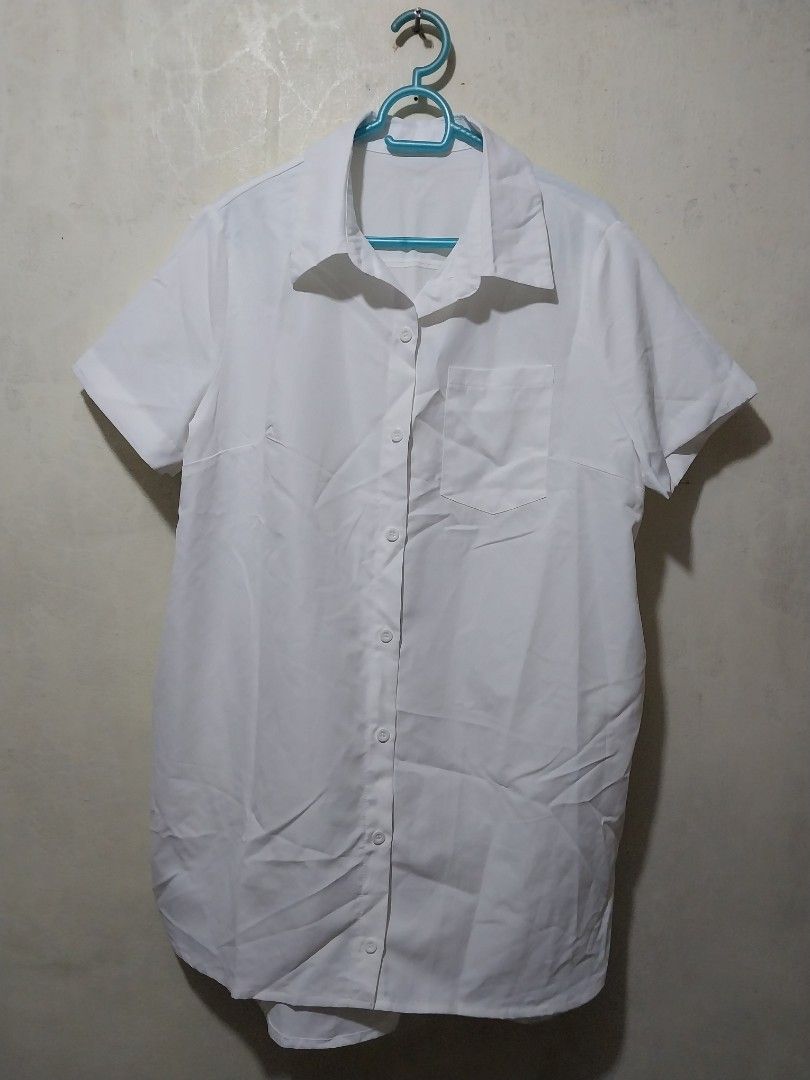 White Short Sleeve Button Up dress with Pocket (Category: Shirts) located in Manila. Submitted by PrinceDani.Clothing (Listing ID 1468762744, Image 2). Description: white polo buttondown dress with pockets large to xl fit 23in width 32-34in length excellent condition .