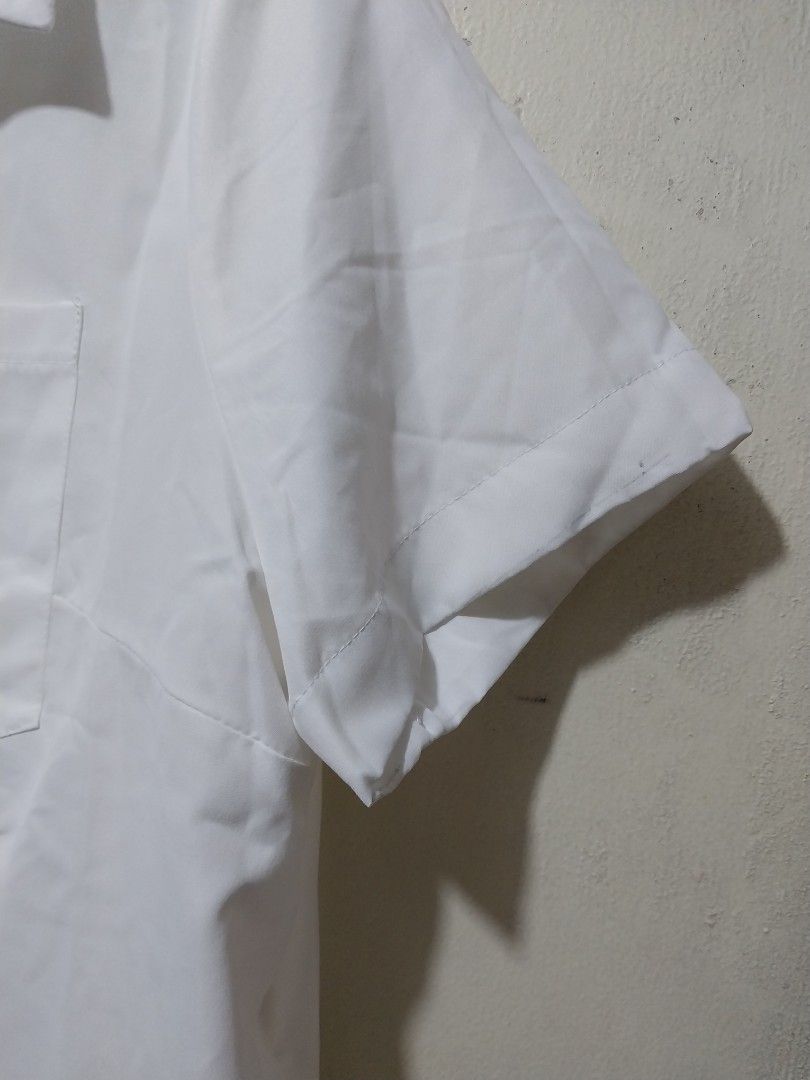 White Short Sleeve Button Up dress with Pocket (Category: Shirts) located in Manila. Submitted by PrinceDani.Clothing (Listing ID 1468762744, Image 3). Description: white polo buttondown dress with pockets large to xl fit 23in width 32-34in length excellent condition .
