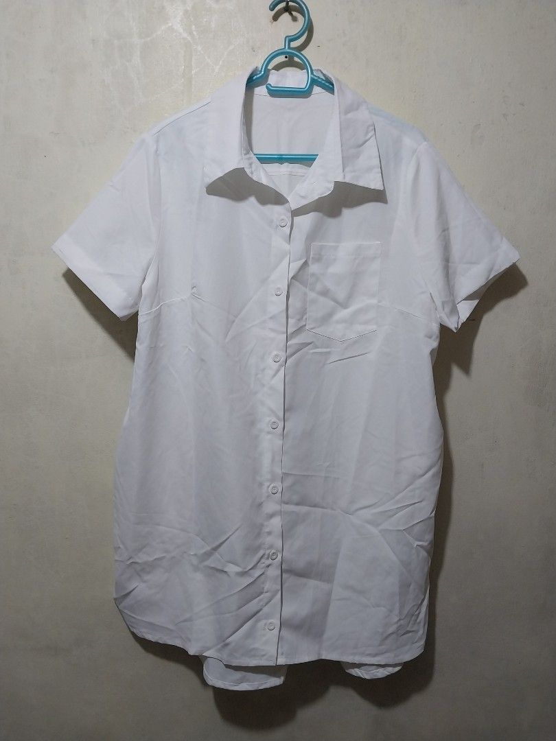 White Short Sleeve Button Up dress with Pocket (Category: Shirts) located in Manila. Submitted by PrinceDani.Clothing (Listing ID 1468762744, Image 1). Description: white polo buttondown dress with pockets large to xl fit 23in width 32-34in length excellent condition .
