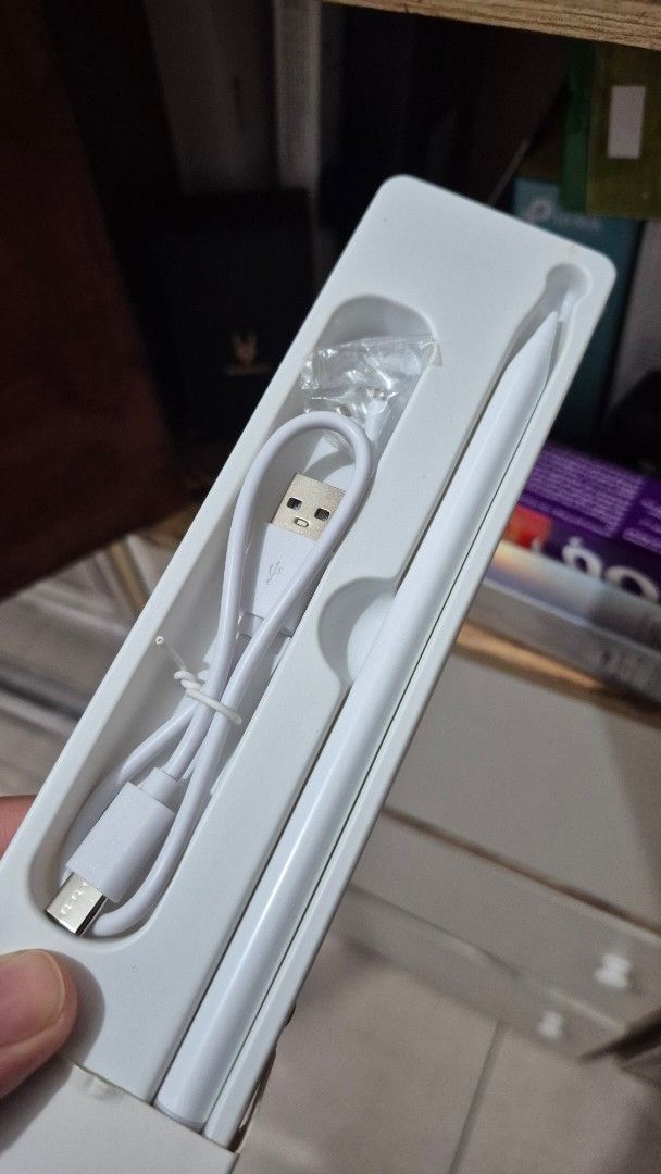 White Stylus Pen with USB Charging Cable (Category: Stationery & School Supplies) located in Pasig City. Submitted by yilin04 (Listing ID 1468925506, Image 2). Description: - Color: Clean white finish with a sleek design - Compatibility: Works with tablets and touchscreens - Ready to use: Straight out of the box - What's included: USB charging cable and replacement tips in original packaging - Ideal for: Daily note-taking and drawing.