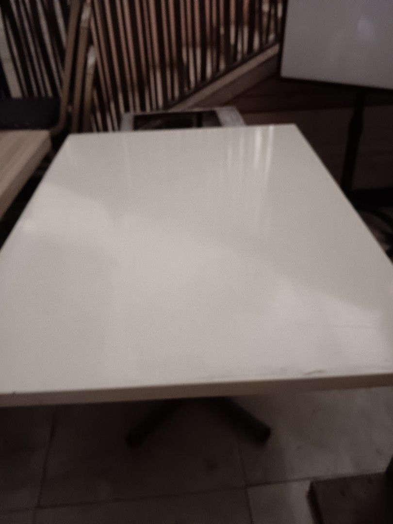 White tabletop with sturdy metal cross-base support (Category: Tables & Sets) located in Las Pinas. Submitted by jesus1smysavi0r (Listing ID 1468929372, Image 3). Description: - Color/Finish: Clean white surface top - Base: Strong metal pedestal with stable cross-shaped legs - Multi-purpose: Ideal for dining, working, or studying - Fit: Standard height, fits well in various room layouts - Fulfillment: Ready for pickup or delivery.