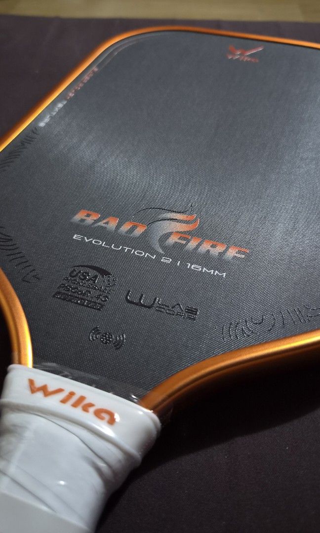 Wika baofire 2 (Category: Racket and Ball Sports) located in Cavite. Submitted by jhonvic.ef (Listing ID 1468495682, Image 2). Description: 🏓 FOR SALE: Wika Baofire 2 Pickleball Paddle (2 on-hand) 🎁 FREEBIES INCLUDED: ✅ Grip Tape ✅ Edge Guard ✅ Paddle Cover 📍 Meet-up locations: • SM Bacoor • Imus • Kawit • SM Tanza • Gentri • Dasma Can do shipping (shipping fee covered by the buyer) 📩 Message me for inquiries and negotiations! Price: 5,500 ph