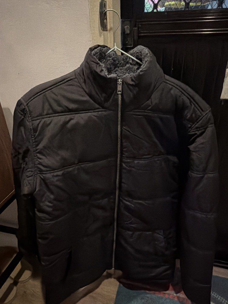 Winter Jacket (Category: Coats, Jackets and Outerwear) located in Pasig City. Submitted by shellbyf (Listing ID 1468801258, Image 1). Description: Black puffer Jacket Fleece inside Size M.