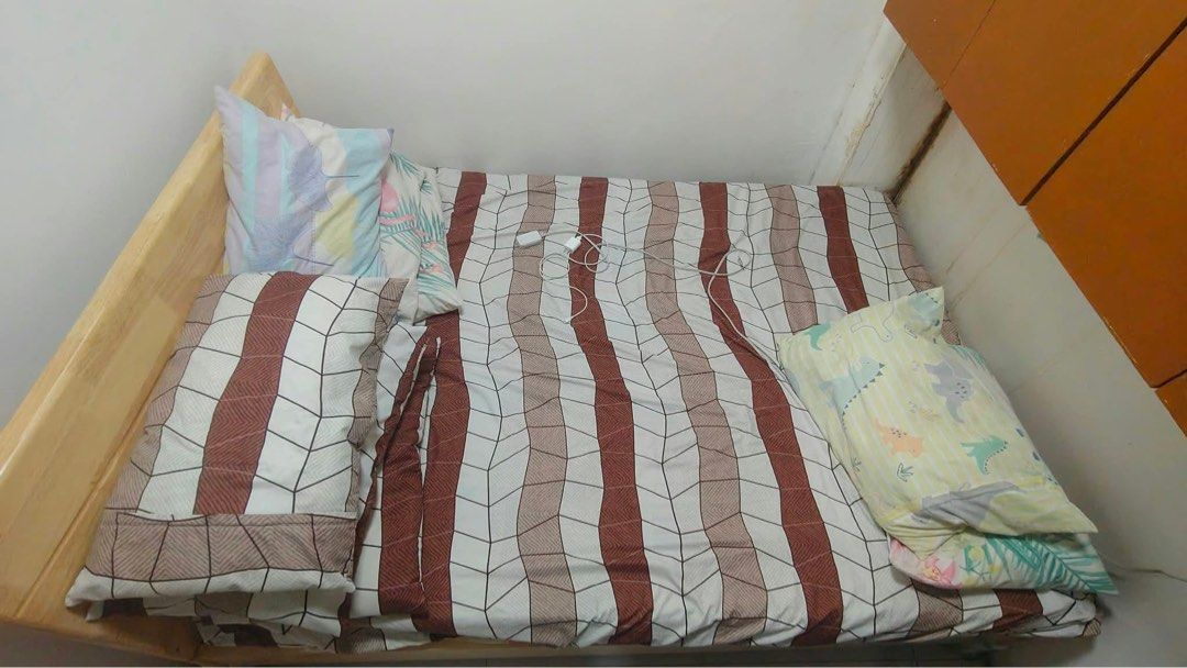 Wooden bed frame with headboard (Category: Bed Frames & Mattresses) located in Antipolo. Submitted by loveee0519 (Listing ID 1468788677, Image 2). Description: - Material: Solid wood with a light wood finish - Design: Clean natural wood grain pattern, minimalist style that matches any bedroom - Features: Sturdy headboard included, stable build with reliable support - Size: Fits standard mattress size nicely - Condition/Logistics: Ready for quick 