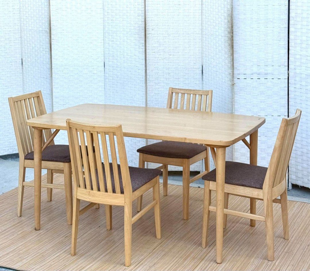 Wooden Dining Table with 4 Chairs (Category: Tables & Sets) located in Manila. Submitted by justinlei.103 (Listing ID 1468838696, Image 1). Description: JAPAN SURPLUS NITORI 4 SEATER DINING SET IN GOOD CONDITION SIZE: 27.5H x 55L x 31.5W inches 17H x 16L x 16W inches.
