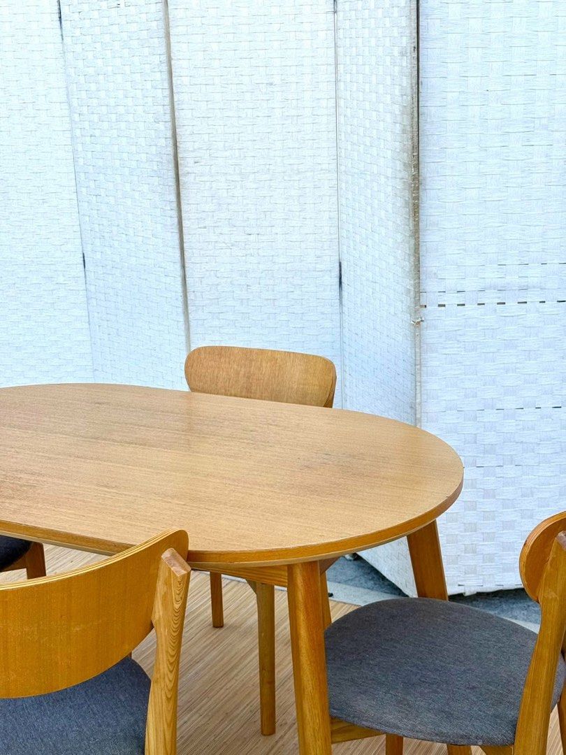 Wooden Dining Table with Four Chairs (Category: Tables & Sets) located in Manila. Submitted by justinlei.103 (Listing ID 1468834506, Image 3). Description: JAPAN SURPLUS 4 SEATER MODERN DESIGN OVAL DINING SET IN GOOD CONDITION SIZE: 28.5H x 51L x 31.5W inches 16.5H x 17L x 17.5W inches.