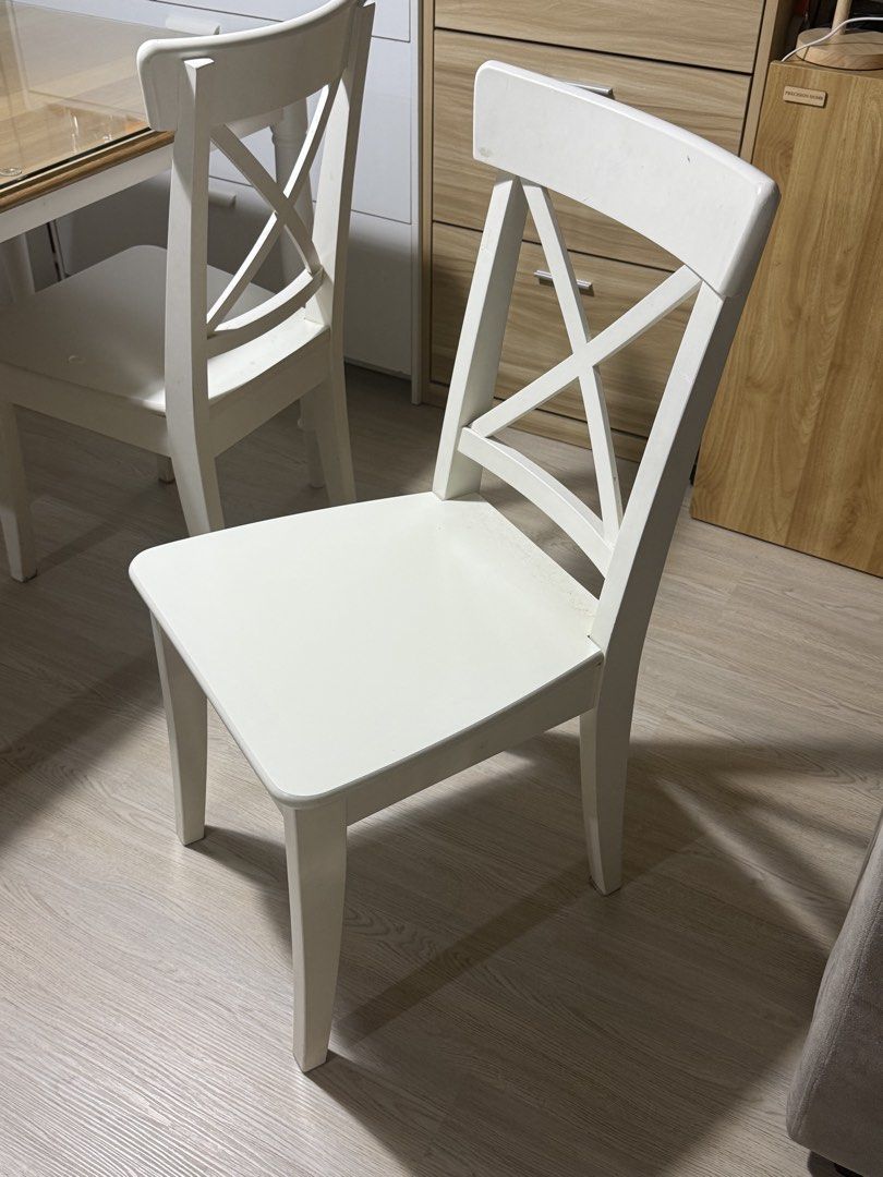 IKEA Wooden Set (Category: Tables & Sets) located in Taguig. Submitted by gabby33.rocky29 (Listing ID 1468742566, Image 2). Description: Selling our dining set for P13K Purchase price for all is P25K Addresss: Ivory Wood, Acacia Estates, Bambang Inclusions: 🍽️ Dandeyrd Table: 120x80x75cm (good for four people) Oak colored top and white base with fabricated tempered glass top 🪑Ingolf Chairs (2 pcs): All white 🪑Besta Multi Storage and Serves as 
