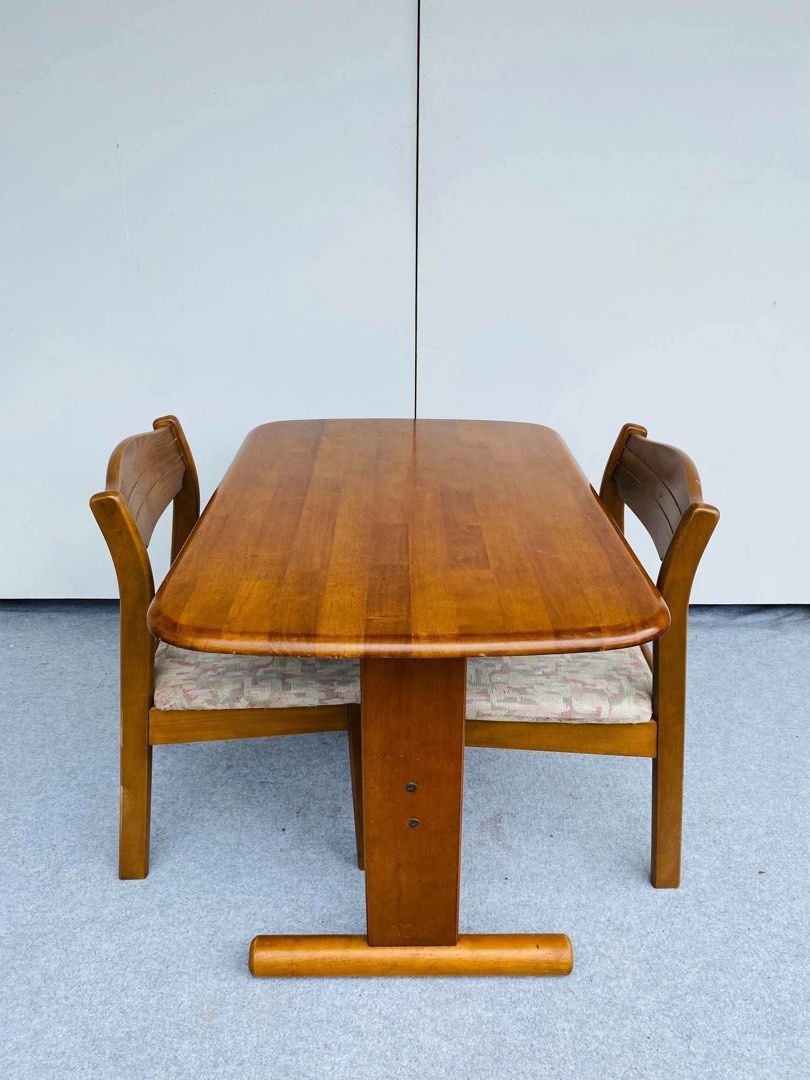 Wooden dining table with two cushioned chairs (Category: Tables & Sets) located in Manila. Submitted by justinlei.103 (Listing ID 1468831263, Image 2). Description: “JAPAN SURPLUS” 2-SEATER SOLID WOOD DINING SET SIZE: 37L” x 25W” x 27H” inches 18L” x 18W” x 16Sh” x 30H” inches (AS-IS ITEM) IN GOOD CONDITION.