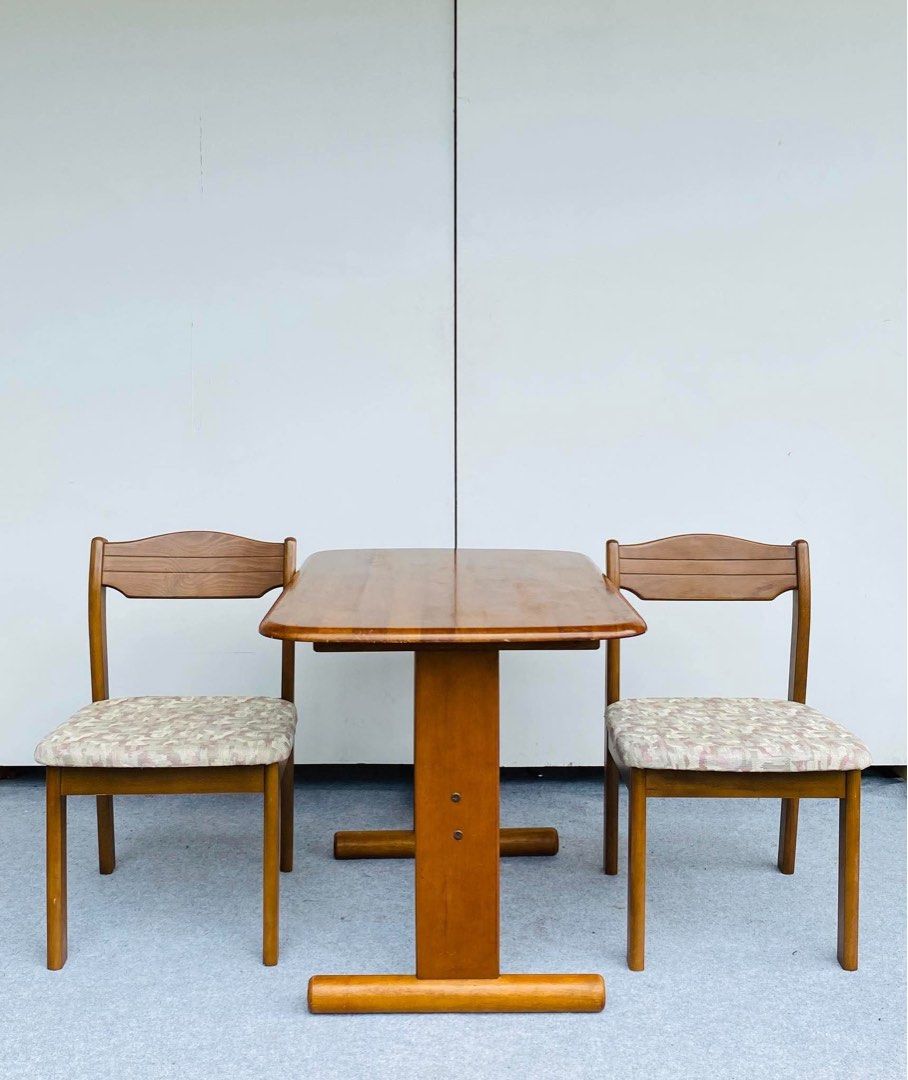 Wooden dining table with two cushioned chairs (Category: Tables & Sets) located in Manila. Submitted by justinlei.103 (Listing ID 1468831263, Image 3). Description: “JAPAN SURPLUS” 2-SEATER SOLID WOOD DINING SET SIZE: 37L” x 25W” x 27H” inches 18L” x 18W” x 16Sh” x 30H” inches (AS-IS ITEM) IN GOOD CONDITION.