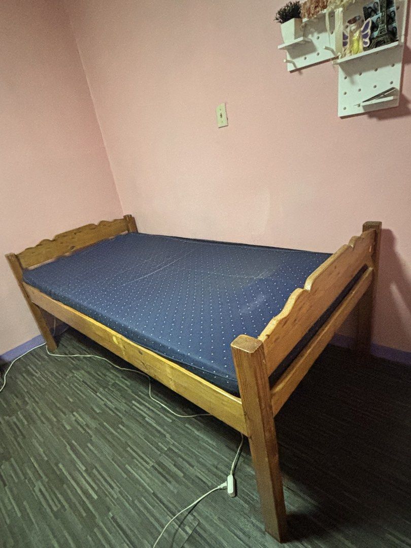 Wooden Single Bed Frame (Category: Bed Frames & Mattresses) located in Taguig. Submitted by jerealmvp (Listing ID 1468872112, Image 2). Description: - single size - wooden bed frame - kasama na po yung kutson - sf shouldered by buyer/pwede din pick up sta ana taguig area.