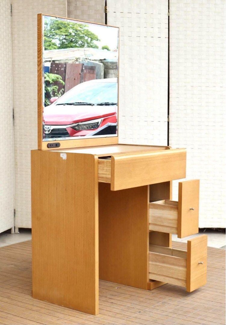 Wooden Vanity Table With Mirror And Drawers (Category: Tables & Sets) located in Manila. Submitted by justinlei.103 (Listing ID 1468808860, Image 2). Description: JAPAN SURPLUS FURNITURE “NITORI” VANITY DRESSER Size 25L x 16W x 54H in inches (AS-IS ITEM) *Minimal Scratch Only IN GOOD CONDITION.