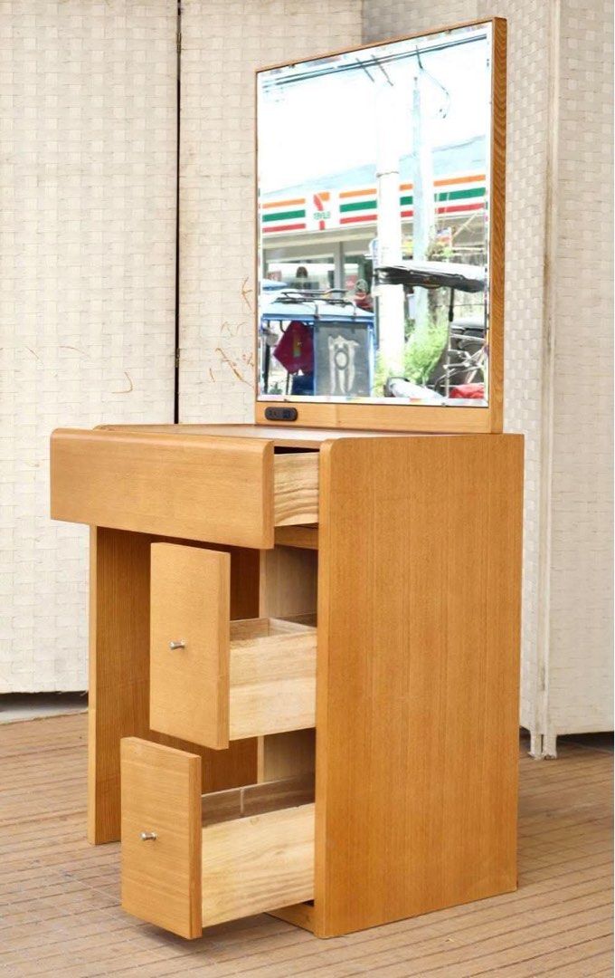 Wooden Vanity Table With Mirror And Drawers (Category: Tables & Sets) located in Manila. Submitted by justinlei.103 (Listing ID 1468808860, Image 1). Description: JAPAN SURPLUS FURNITURE “NITORI” VANITY DRESSER Size 25L x 16W x 54H in inches (AS-IS ITEM) *Minimal Scratch Only IN GOOD CONDITION.