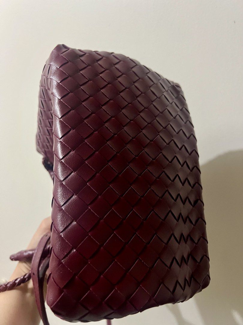 Woven soft leather parachute bag (Category: Cross-body Bags) located in Manila. Submitted by aj3luv (Listing ID 1468809996, Image 3). Description: Soft leather woven parachute bag Color: red wine Comes with long strap and wallet .