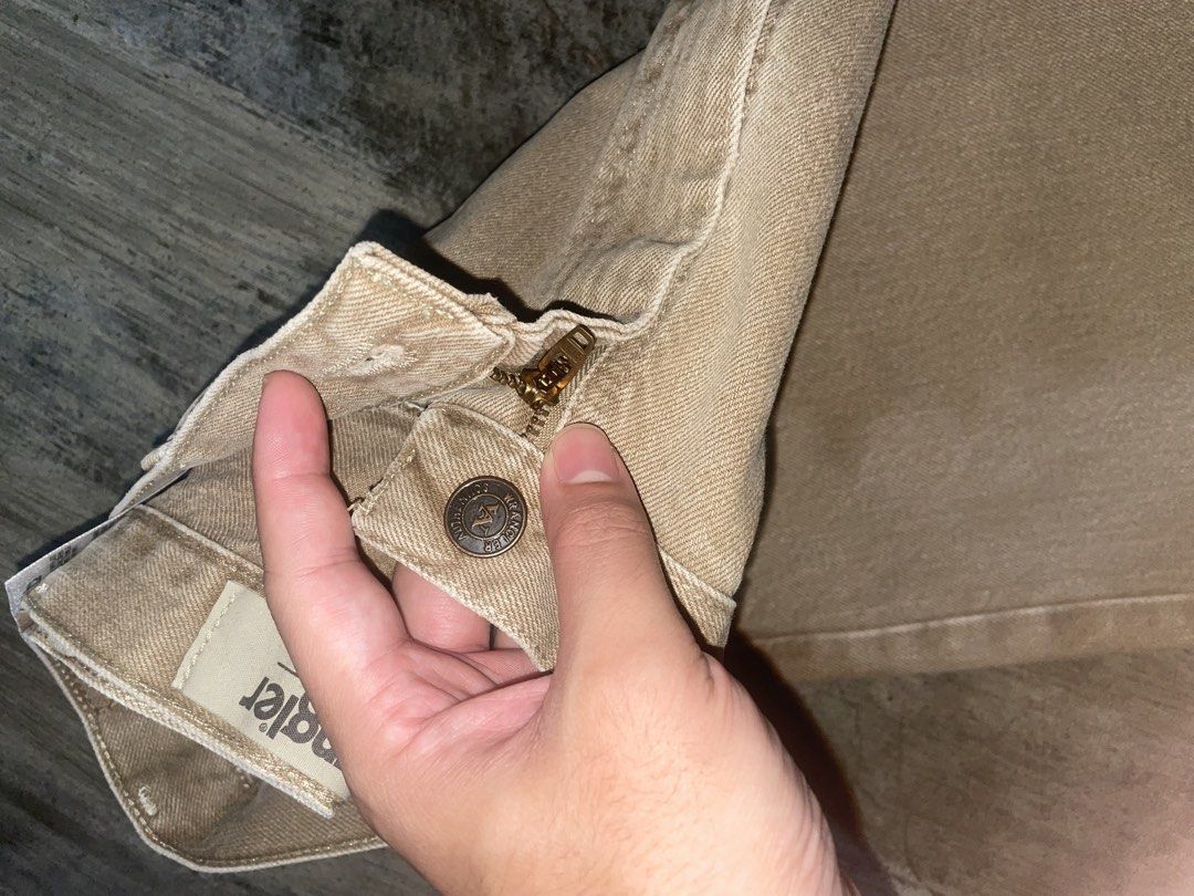 Wrangler Authentics Tan Denim Jeans Size 36x29 (Category: Jeans) located in Caloocan City. Submitted by grandhawk-a3f0a4 (Listing ID 1468881735, Image 2). Description: - Brand: Wrangler Authentics - Size: 36 x 29 - Color: Versatile tan / khaki shade - Material: Sturdy, durable cotton fabric - Design: Classic five-pocket styling - Closure: Metal button with zip fly - Condition: Clean hems and solid construction throughout.