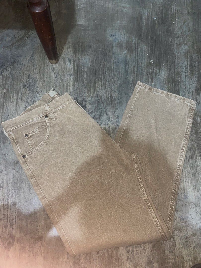 Wrangler Authentics Tan Denim Jeans Size 36x29 (Category: Jeans) located in Caloocan City. Submitted by grandhawk-a3f0a4 (Listing ID 1468881735, Image 1). Description: - Brand: Wrangler Authentics - Size: 36 x 29 - Color: Versatile tan / khaki shade - Material: Sturdy, durable cotton fabric - Design: Classic five-pocket styling - Closure: Metal button with zip fly - Condition: Clean hems and solid construction throughout.
