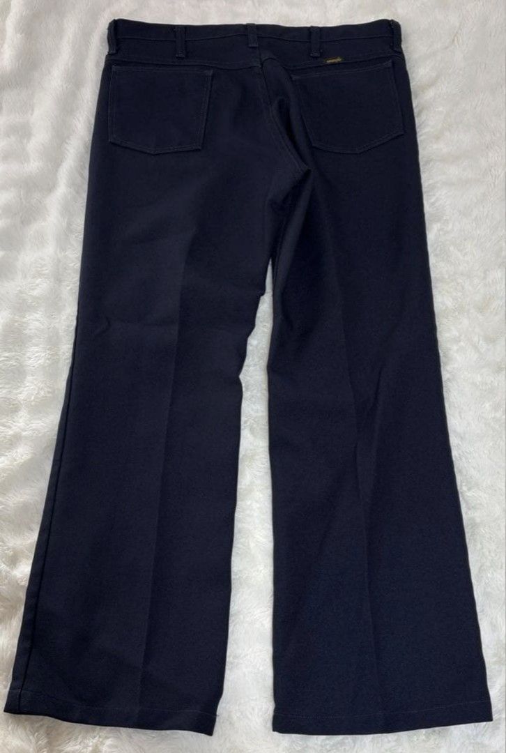 Wrangler Rancher Pants (Category: Jeans) located in Cebu City. Submitted by south_thrift (Listing ID 1468773217, Image 2). Description: Wrangler Rancher Pants, Navy, W36, Made in Mexico of USA fabric. Size: W36 L30. Actual measurements: Waist 90cm, Rise 30cm, Inseam 72.5cm, Thigh width 30cm, Hem width 23.5cm, Total length 99.5cm. Please note that these are amateur measurements. ✴︎As this is a vintage item, please refrain from purchasing if you re