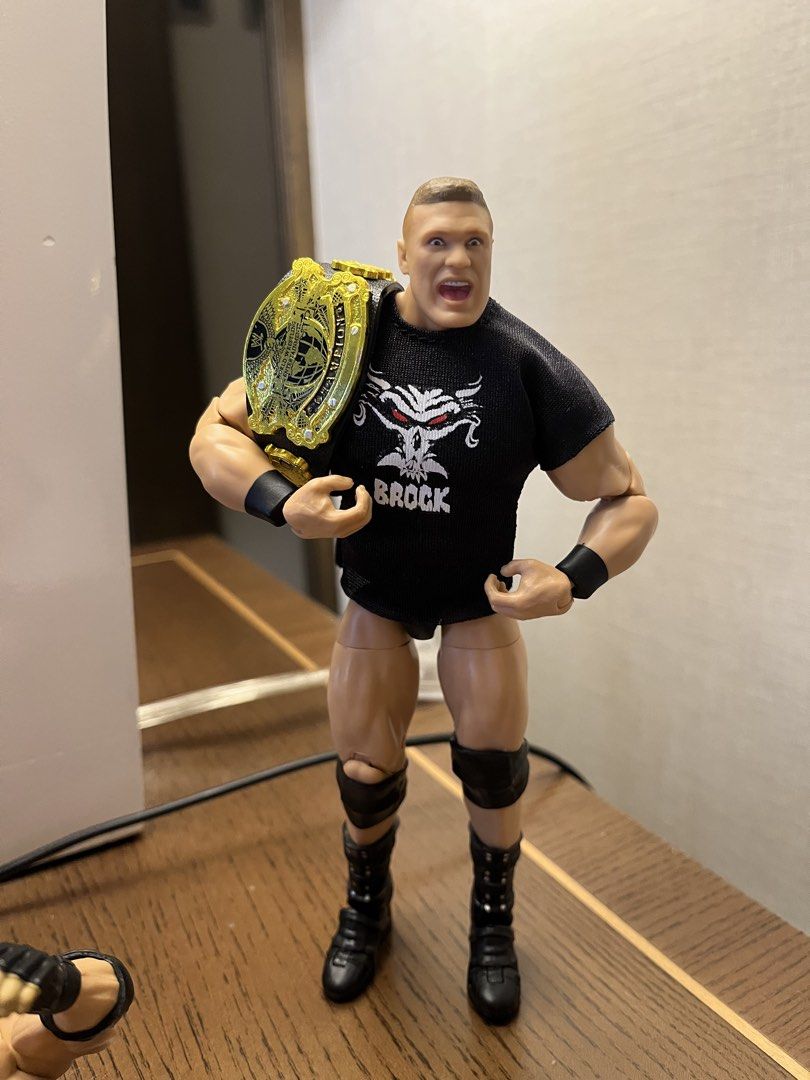 WWE Ultimate Edition Brock Lesnar Ruthless Agression (Category: Action & Battle Toys) located in Quezon City. Submitted by pau_h (Listing ID 1468848574, Image 2). Description: - Brand: Mattel Ultimate Edition - Character: Brock Lesnar - Condition: mint condition / back in box / good as bnew - Articulation: Fully poseable - Accessories included: Multiple interchangeable head sculpts, extra hands, black graphic t-shirt, and a championship belt - Pe