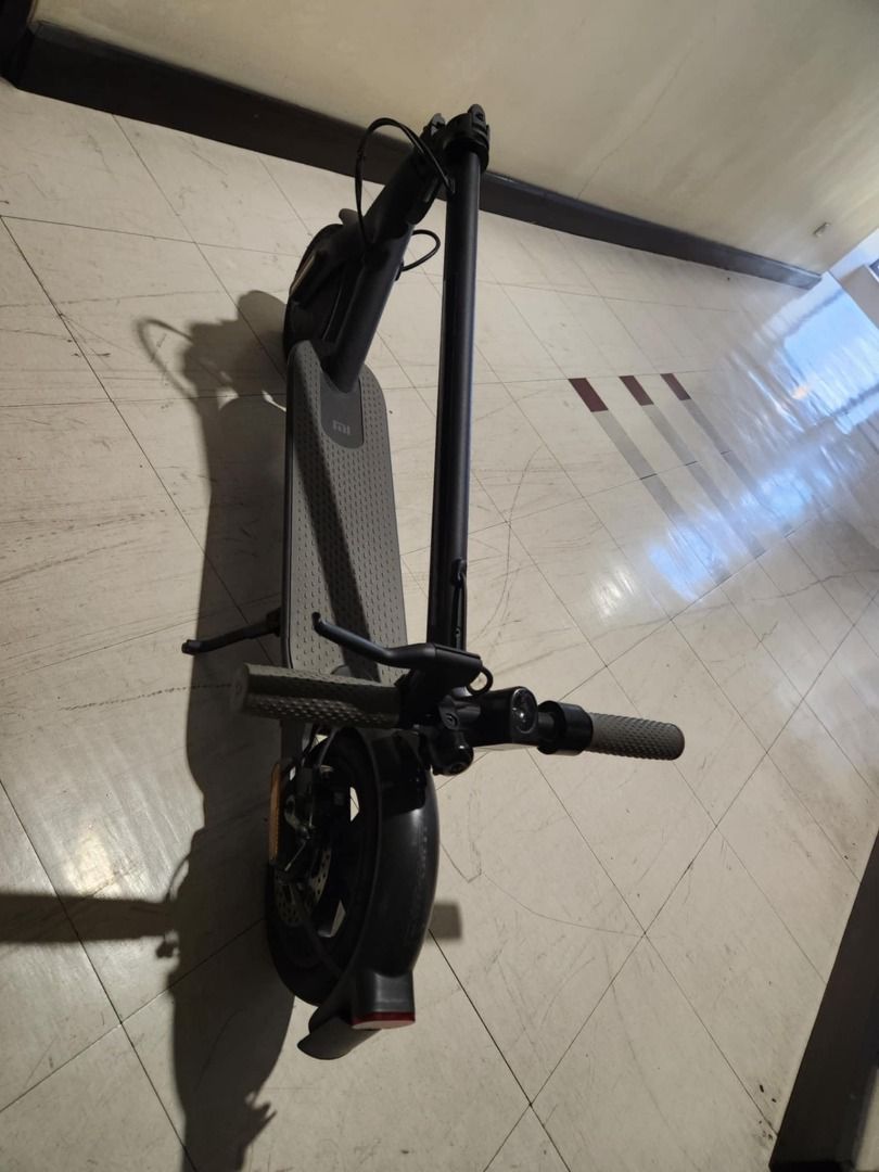 Xiaomi electric scooter (Category: Looking For) located in Pasig City. Submitted by brightmountain_41dca8 (Listing ID 1468765125, Image 2). Description: Xiaomi electric scooter With charger, spare tire and helmet, Slightly used RFS: decluttering.