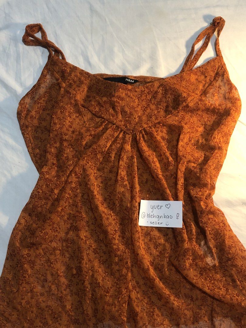 y2k esoteric 2000s orange spaghetti strap top (Category: Blouses) located in Manila. Submitted by blehgnbao (Listing ID 1468764189, Image 1). Description: 🤍 from cavite area • only worn twice • slightly translucent •auth h&m top sf covered by buyer :) lalamove delivery & gcash payment only. dm for more details!.
