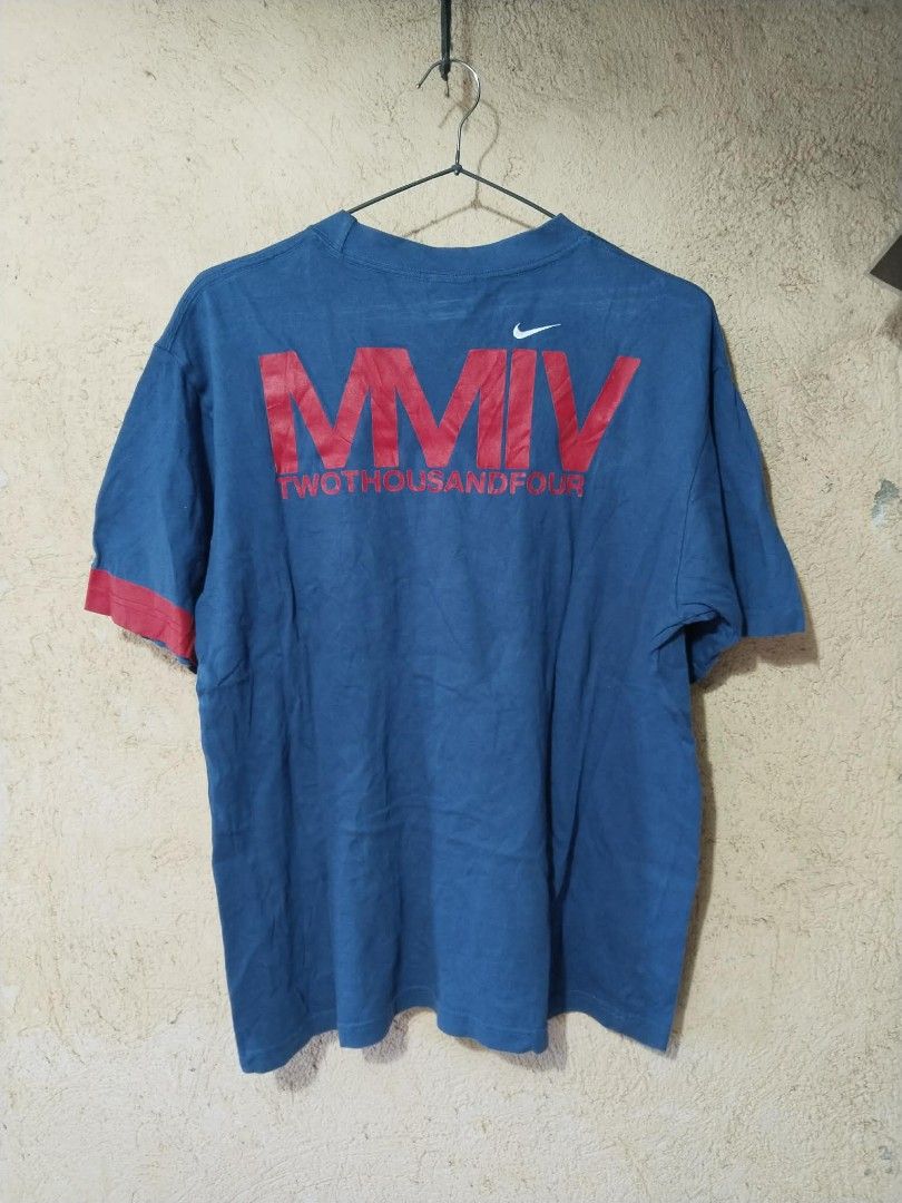 Y2k Nike Tshirt (Category: Activewear) located in Cavite. Submitted by sacmaestro444 (Listing ID 1468775279, Image 2). Description: Medium on tag Good condition Crack Print on sleeve 9/10 colorate.