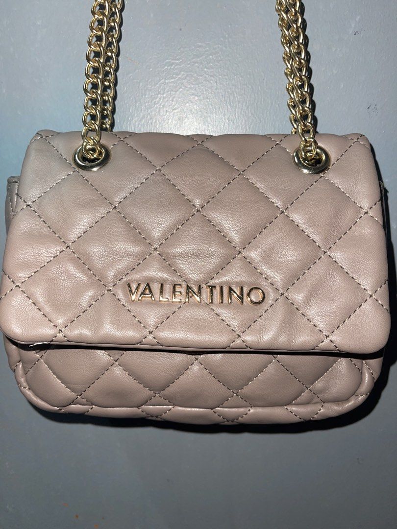 Y2K Valentino Ocarina Evening Bag (Category: Shoulder Bags) located in Dipolog. Submitted by throsetbycheemarie (Listing ID 1468815242, Image 2). Description: Kasya cellphone and short wallet With washtag Stylish, practical & aesthetic Designer bag with chain details Fashion statement Eye-catching prints & textures for an individual look Ideal for essentials (mobile phone, wallet, keys) Flap with snap lock Slide-in pocket Inner pocket with zip fa