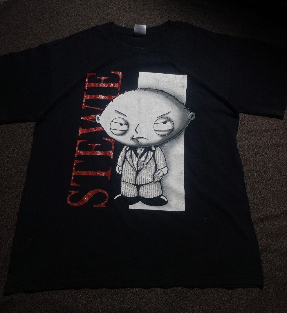 Y2K Vintage Tshirts (Category: Tshirts & Polo Shirts ) located in Manila. Submitted by gfinds. (Listing ID 1468832710, Image 2). Description: Y2K-era Family Guy "Scarface" Stewie Griffin graphic t-shirt Condition: 9/10 Size: Large To XL CR: 9/10 Good Condition Gildan on tag‼️ PM for More information and Details.
