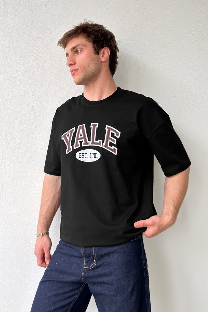 Yale University Embroidered Logo (Category: Tshirts & Polo Shirts ) located in Cavite. Submitted by onebeancent (Listing ID 1468911169, Image 1). Description: Size: XL TO XXL Dimension: 25" Width | 30" Length Color: Black Color Rate: 10/10 Issue: None Condition: Like new‼️ Price: 550php Additional Shipping Fee (J&T Small Pouch) 75php Luzon 100php visayas 120php mindanao.