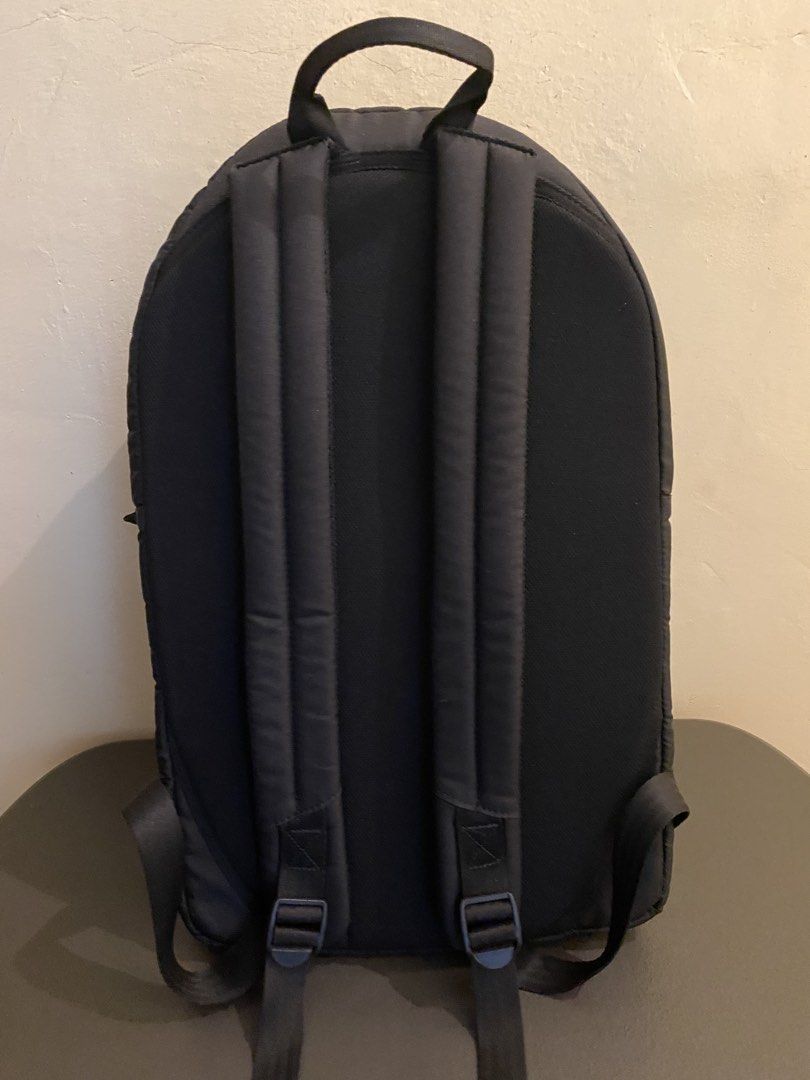 Yonex Racket Backpack (Category: Backpacks) located in Manila. Submitted by syrusaluzanjr (Listing ID 1468922133, Image 2). Description: - Brand: Yonex - Color: Black with blue/white mountain abstract inner lining - Storage: Multiple spacious zippered compartments for gear, shoes, and daily essentials - Comfort: Padded shoulder straps and convenient top grab handle - Condition: Clean inside and out, well-maintained.