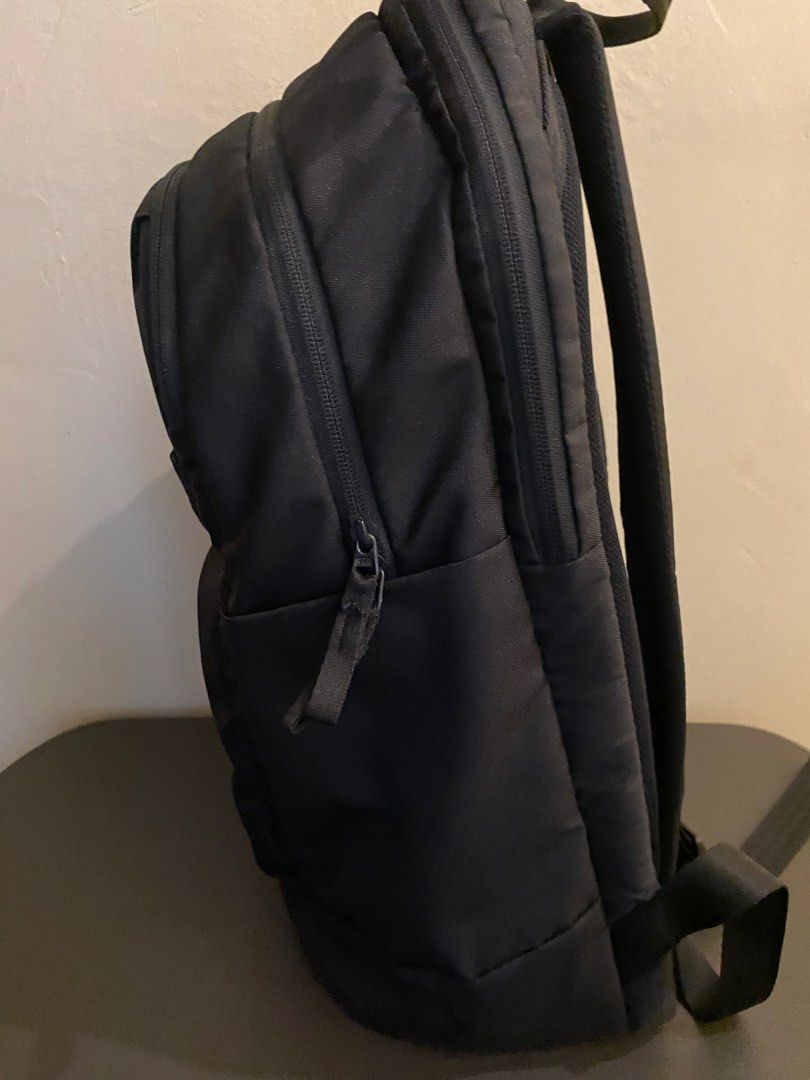Yonex Racket Backpack (Category: Backpacks) located in Manila. Submitted by syrusaluzanjr (Listing ID 1468922133, Image 3). Description: - Brand: Yonex - Color: Black with blue/white mountain abstract inner lining - Storage: Multiple spacious zippered compartments for gear, shoes, and daily essentials - Comfort: Padded shoulder straps and convenient top grab handle - Condition: Clean inside and out, well-maintained.