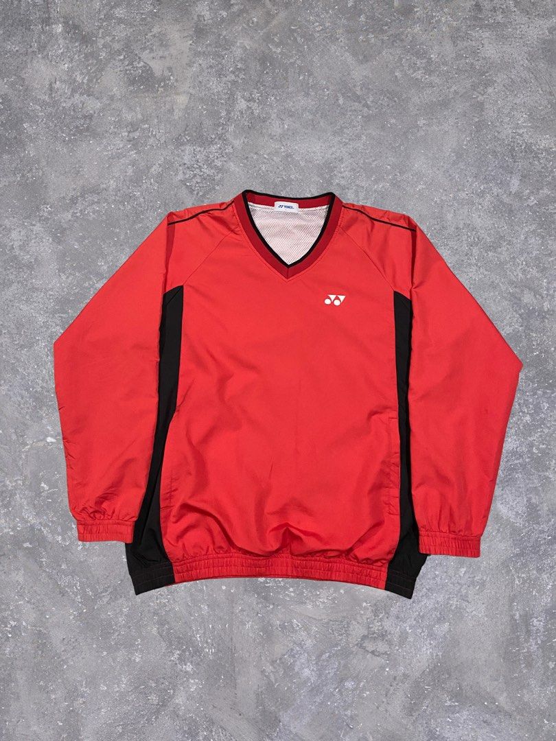 Yonex V-Neck Windbreaker Jacket Red Black Size L (Category: Coats, Jackets and Outerwear) located in Baguio. Submitted by chicoroy (Listing ID 1468882473, Image 1). Description: - Brand: Yonex - Style: Windbreaker / Athletic Jacket - Color: Vibrant Red with Black side panels and trim - Size: L (Tag size) Dimes:23.5/27 Need wash - Material: 100% Polyester (Shell and lining) - Features: Classic V-neck collar, breathable mesh inner lining, embroider