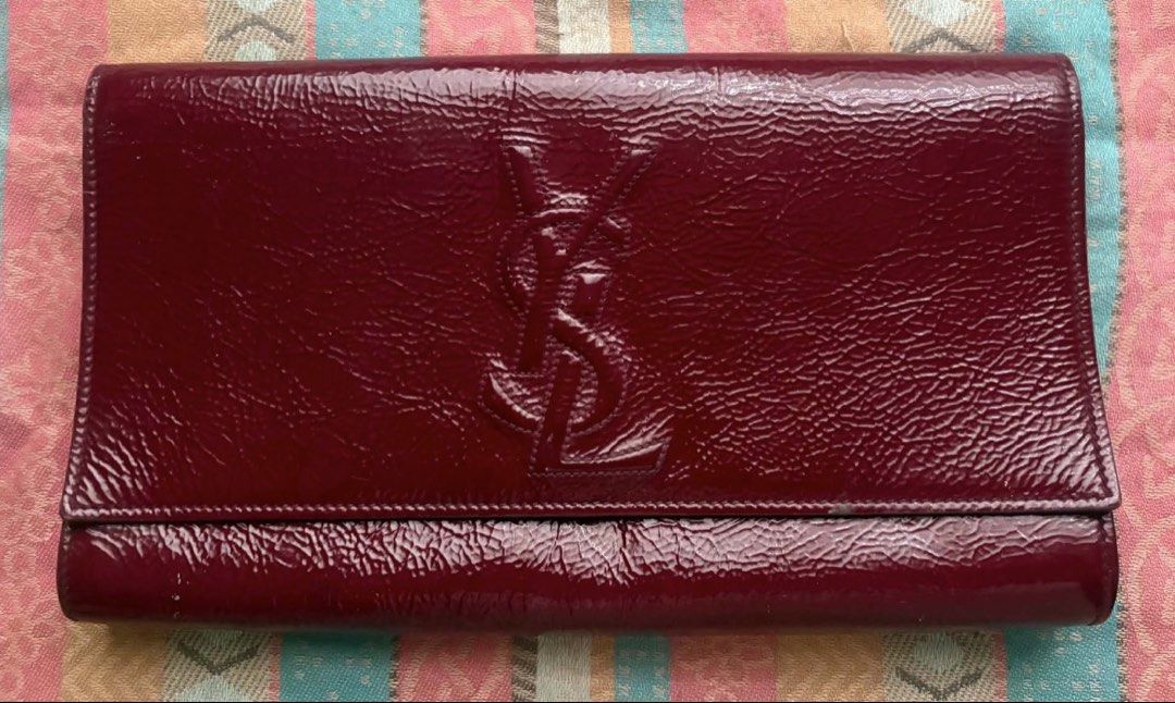 YSL patent clutch (Category: Luxury Bags & Wallets) located in San Juan City. Submitted by valenzcloset (Listing ID 1468897748, Image 1). Description: has some scratches but fairly nice pa.