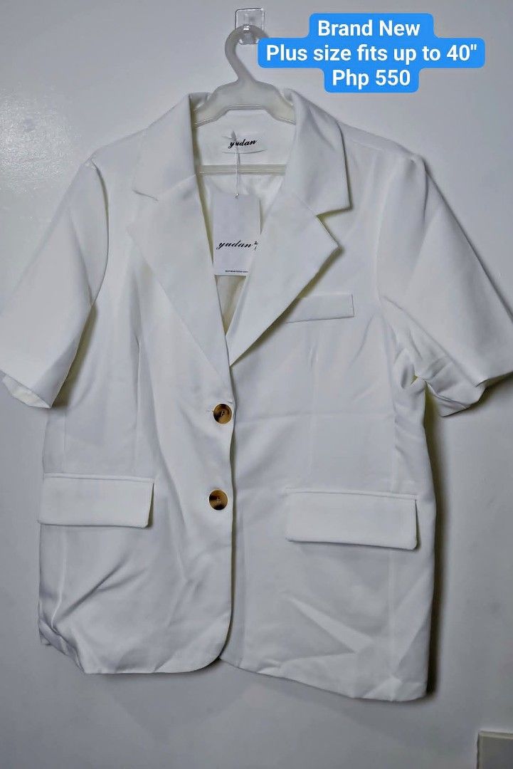 Yudan Plus Size Short Sleeve Blazer (Category: Coats, Jackets and Outerwear) located in Manila. Submitted by chubbychic553 (Listing ID 1468866409, Image 2). Description: - Brand/Style: Yudan short sleeve blazer - Size: Fits up to 40 inches - Design: Classic lapel collar with front button closure - Pockets: Includes functional front pockets and a chic chest pocket detailing - Fit: Structured fit - Versatility: Ideal for casual or smart casual outf