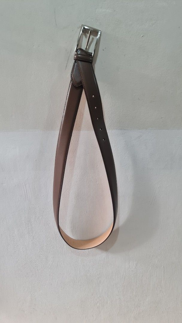 Yves Saint Laurent Leather Belt (Category: Belts) located in Caloocan City. Submitted by royaldragon_d59aba (Listing ID 1468792973, Image 1). Description: - Brand: Yves Saint Laurent (YSL) - Material: 100% Genuine Leather - Origin: Made in Italy - Hardware: Silver-tone buckle - Design: Classic brown strap with clean edge stitching - Versatility: Standard width, perfect for trousers or jeans - Condition: Excellent, ready to wear.
